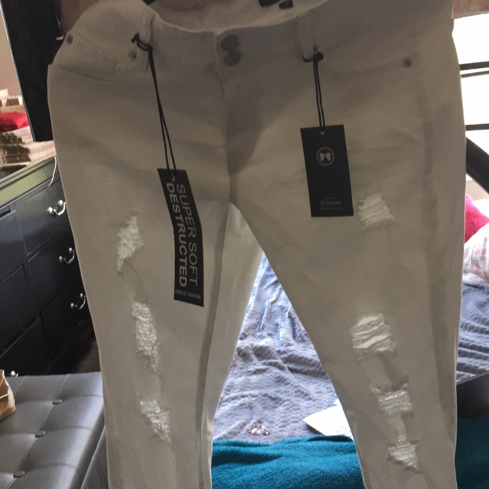 White ripped jeans